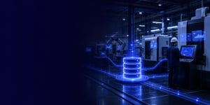 A modern manufacturing shop floor with an employee at the operator terminal and a central database that is networked with the production machines via data streams
